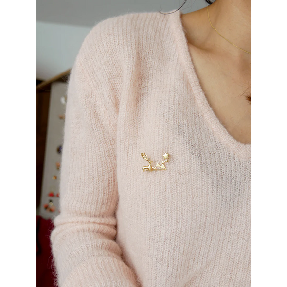 Broche montagne étoilée dorée