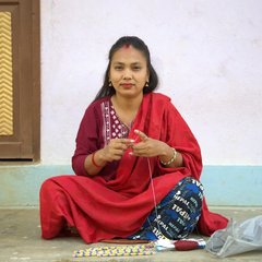 Bracelet népalais Blanc, or, orange, bordeaux, vert