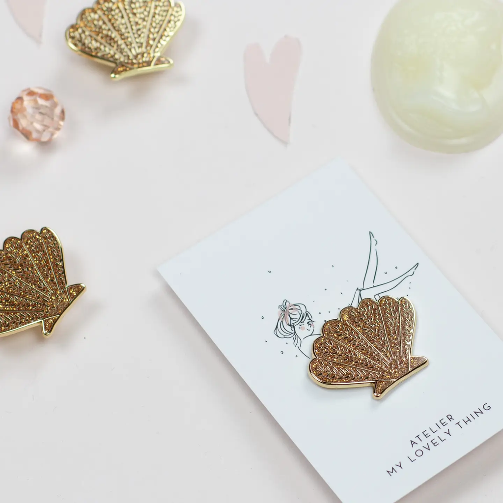 Pin's - Coquillage doré pailleté